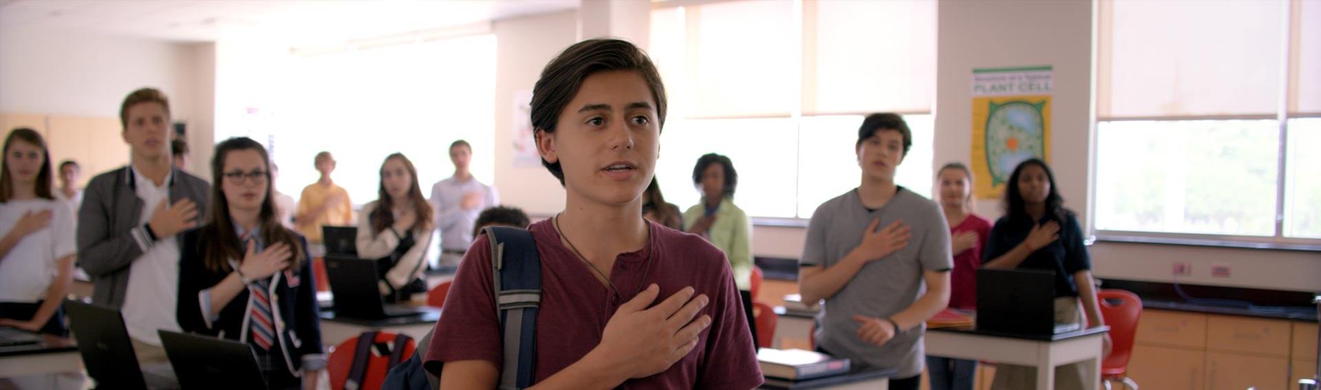 Picture of Isaak Presley reciting the Pledge.